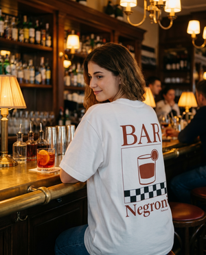 Bar Negroni tee at a warm aperitivo bar